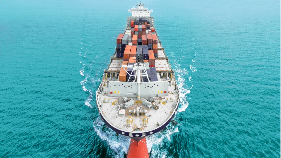 Freight container ship in the middle of the ocean