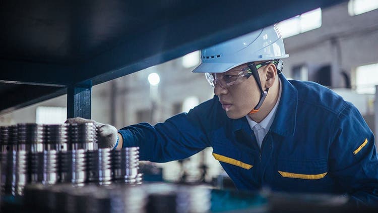 Logistics worker searching for a service part.