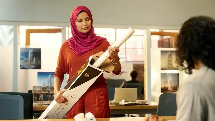 Woman shipping with U-P-S discount.